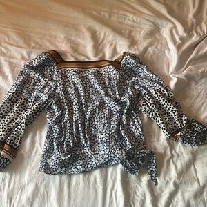Classy but fun open back top !!